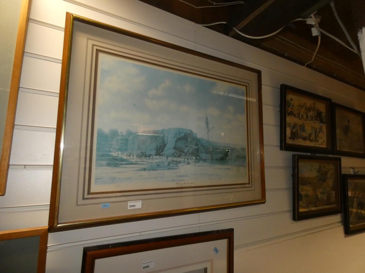 A framed limited edition print of a 19th Century sailing boat "working