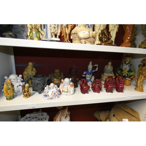 3001 - A quantity of decorative, mainly oriental style ceramic, resin and other figures (2 shelves)