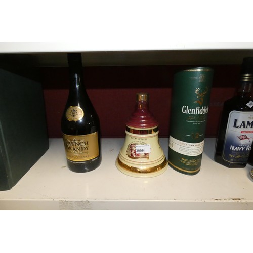 3006 - 1 bottle of French brandy, 2 two bottles of whisky, 2 and 1 small bottle of rum and 1 bottle of bene... 