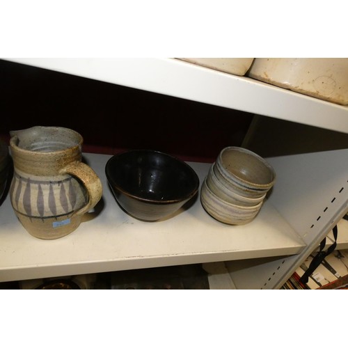 3017 - A quantity of various stoneware kitchen jars and stoneware bottles and jugs etc (two shelves)