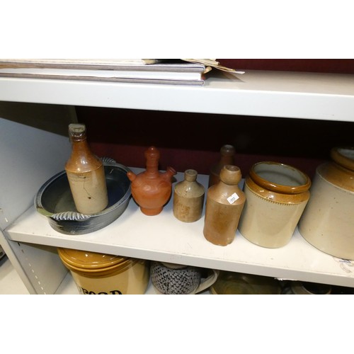 3017 - A quantity of various stoneware kitchen jars and stoneware bottles and jugs etc (two shelves)