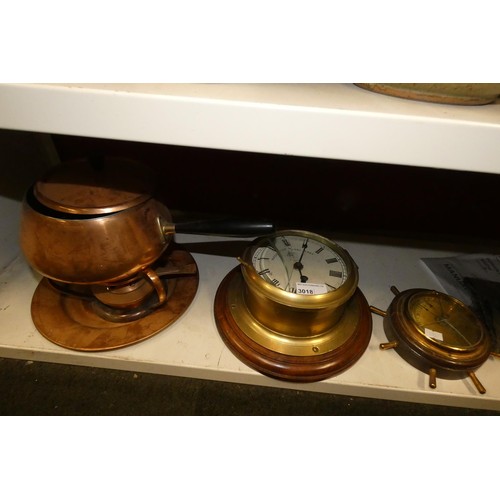 3018 - A brass cased naval clock, a copper fondue set and various other items (one shelf)