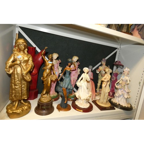 3029 - A collection of tall resin and ceramic figures (2 shelves)