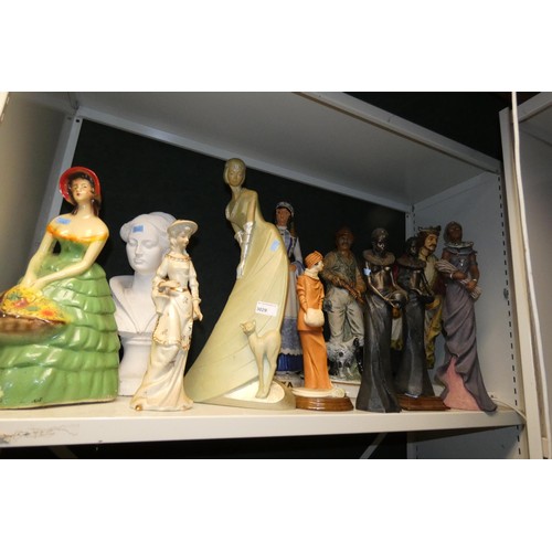 3029 - A collection of tall resin and ceramic figures (2 shelves)