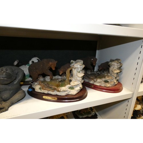 3033 - A collection of resin and ceramic wild animals (3 shelves)