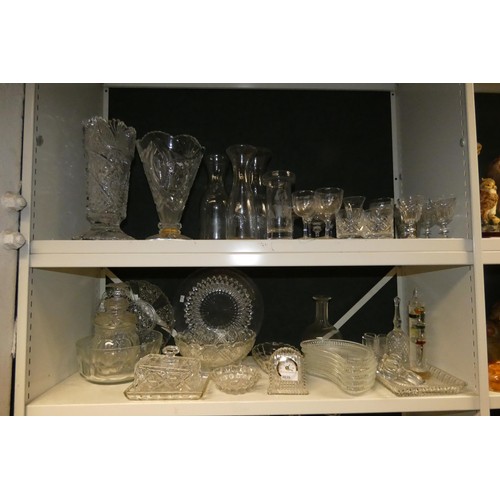 3035 - A large quantity of miscellaneous decorative glassware & a small quantity of chinaware (6 shelves)