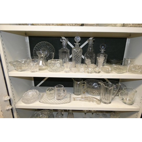 3035 - A large quantity of miscellaneous decorative glassware & a small quantity of chinaware (6 shelves)