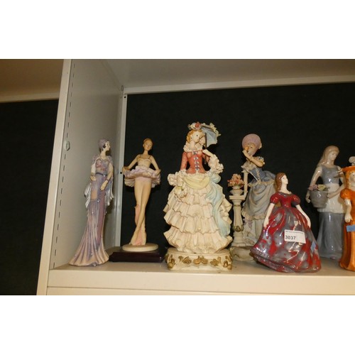 3037 - A collection of miscellaneous resin and ceramic decorative figures of ladies (2 shelves)