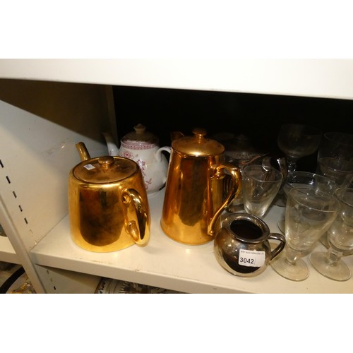 3042 - A quantity of miscellaneous decorative teaware, glassware and silver-plated ware etc (three shelves)