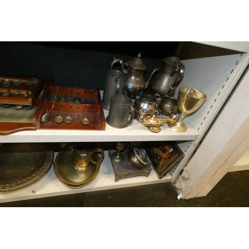 3055 - A large quantity of miscellaneous decorative silver-plated ware and cutlery (4 shelves)