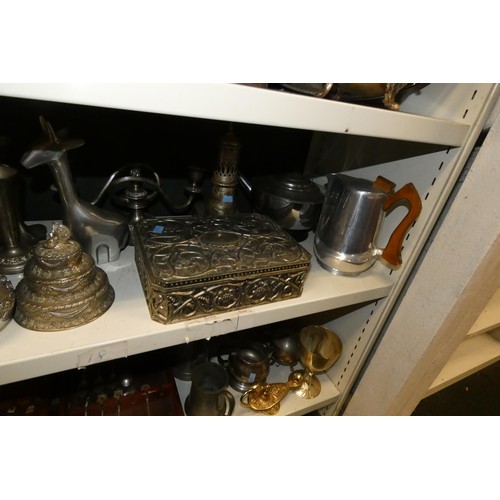 3055 - A large quantity of miscellaneous decorative silver-plated ware and cutlery (4 shelves)