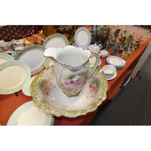 3056 - A Victorian floral patterned jug and basin set