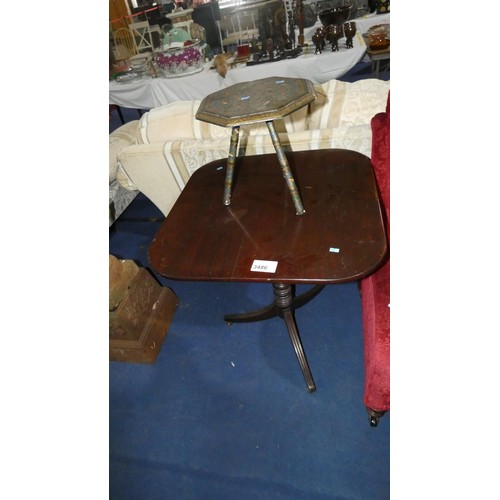 3486 - Mahogany rectangular topped tip-up pedestal table on three splayed legs and a small octagonal top st... 