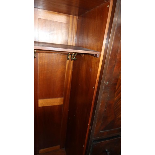 3491 - Mahogany bow front wardrobe with three panel doors & three drawers, approximately 156cm wide.  The t... 