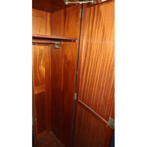 3491 - Mahogany bow front wardrobe with three panel doors & three drawers, approximately 156cm wide.  The t... 