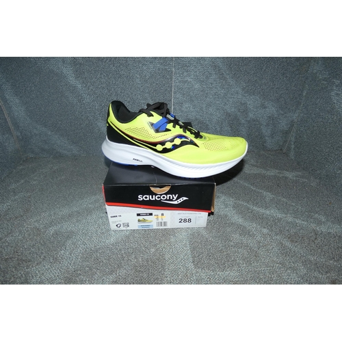 A pair of mens running shoes by Saucony type Guide 15 Acid / blue raz