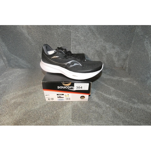 304 - A pair of mens running shoes by Saucony type  Ride 15 Black / white size UK 8