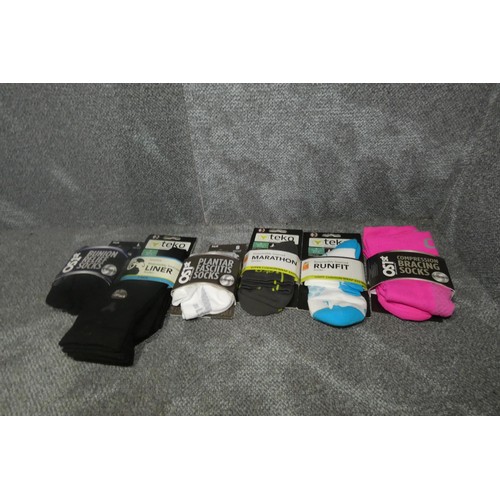 468 - A quantity of various pairs of socks. Contents of 1 mesh basket which is not included (Middle Basket... 