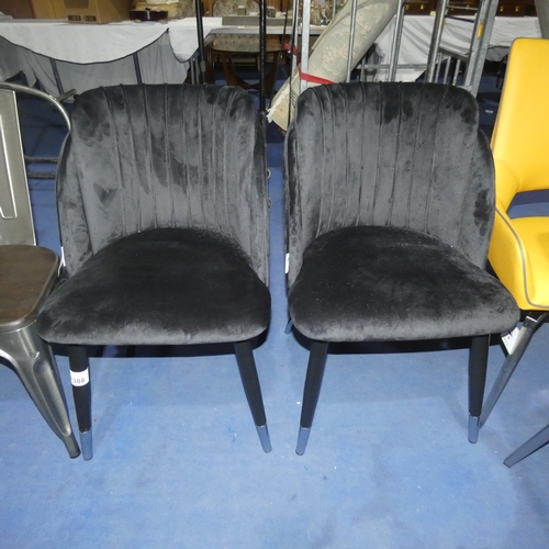 1388 - 2 black upholstered dining chairs