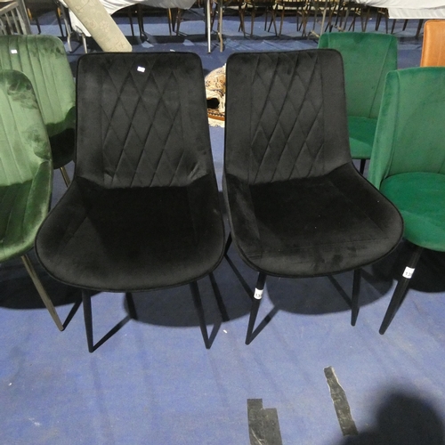 1392 - 2 black upholstered dining chairs