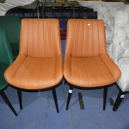 1394 - 2 tan upholstered dining chairs