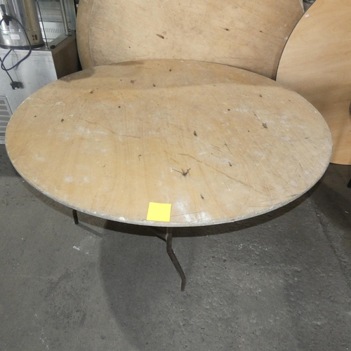 2013 - A large round folding wooden table approx 167cm