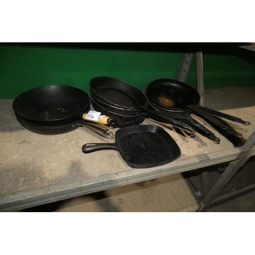 2038 - A quantity of various used frying pans and woks