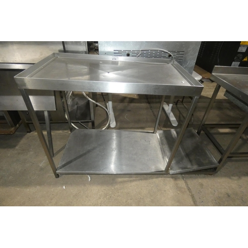 2116 - A commercial stainless steel wet prep table with shelf beneath and off the floor tray storage