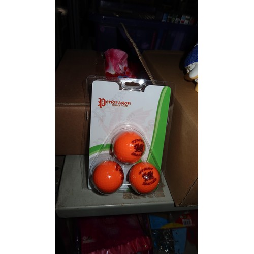 3464 - 4 x boxes containing Approx 144 orange golf balls stamped Cymru Wales