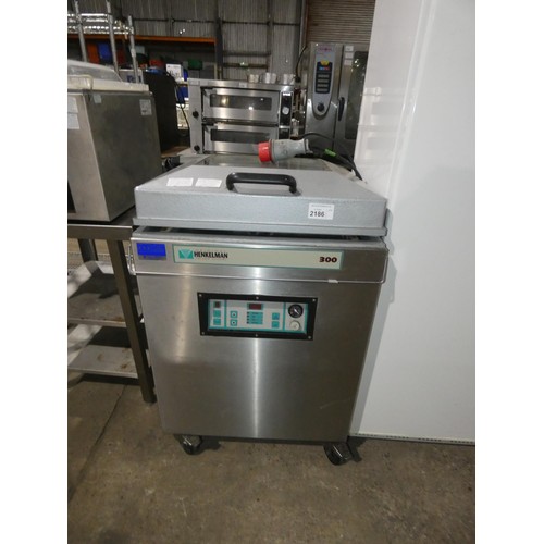 2186 - A large mobile commercial stainless steel vacuum packer by Henkleman type 300 3 phase  - trade