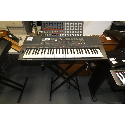 3303 - A Yamaha portable keyboard model PSR-500 no power adapter, comes with a stand - trade. Tested workin... 