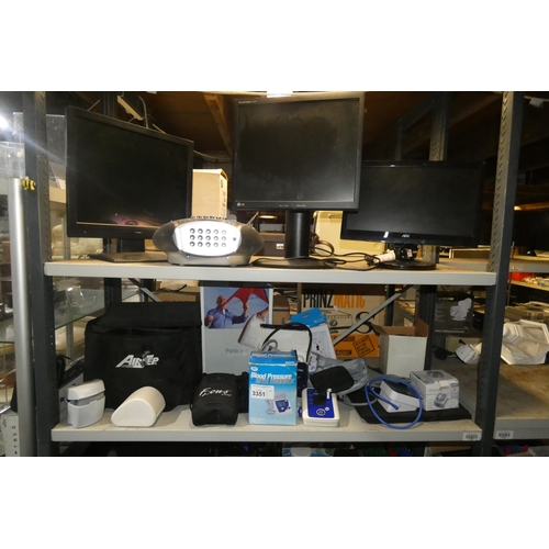 3351 - A quantity of various electronic items including a radio, health aids, pc monitors, blood pressure m... 