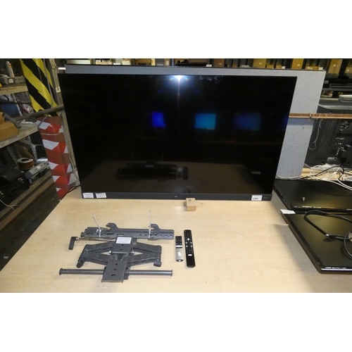 3399 - A 55 inch smart HDTV by TCL model 55EC788 with built in Onkyo soundbar, unit comes with wall bracket... 