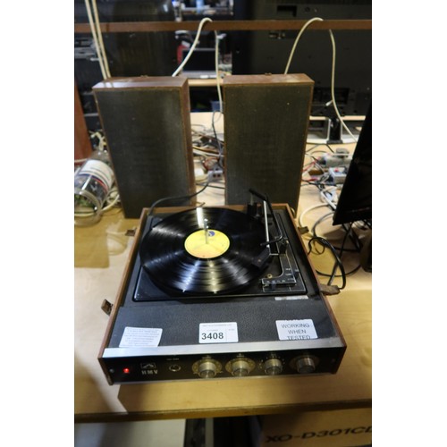 3408 - A vintage record player by HMV type 2025 working when tested - trade