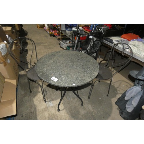 3041 - 1 garden bistro type table diameter approx 75cm and 2 metal stacking garden chairs