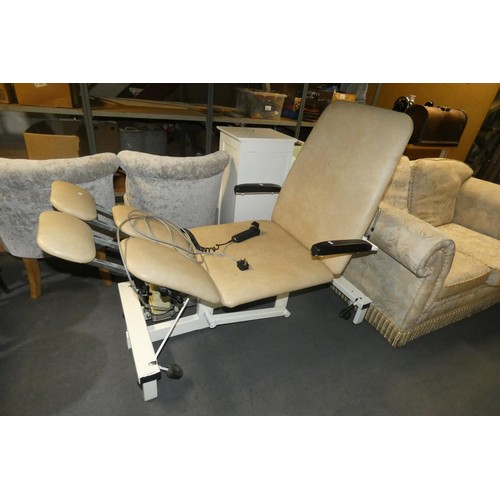 3126 - An adjustable medical examination couch by Plinth 2000, 240v supplied with a wired remote control an... 