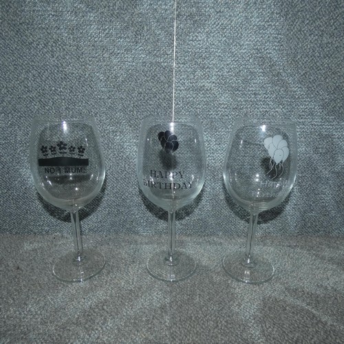 3215 - A quantity of Birthday/wedding day/special occasion gift/novelty wine glasses. Contents of 1 shelf