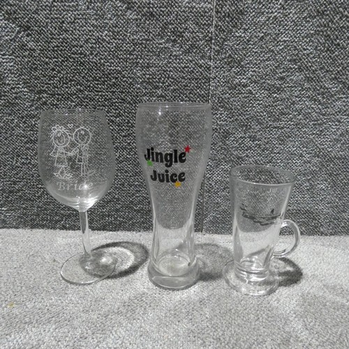 3216 - A quantity of Birthday/wedding day/special occasion gift/novelty wine glasses. Contents of 1 shelf