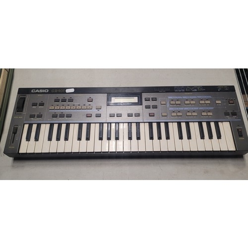 3310 - A vintage digital synthesiser by Casio type CZ-101, comes with a hard carry case, box but no power a... 