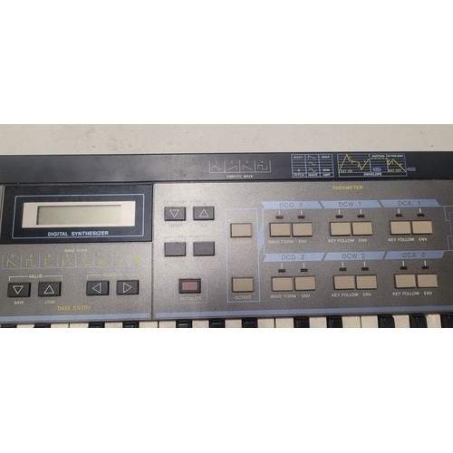 3310 - A vintage digital synthesiser by Casio type CZ-101, comes with a hard carry case, box but no power a... 