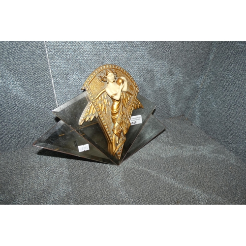 4144 - An Art Deco style miniature wall mirror with angel motif