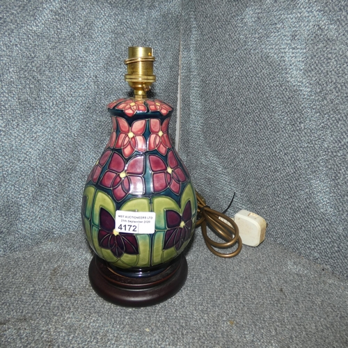 4172 - A Moorcroft violet decorated 8-inch table lamp