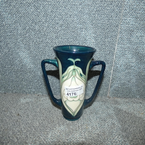 4176 - An art nouveau style twin handled Moorcroft loving cup designed by Rachel Bishop, approximately 6in ... 