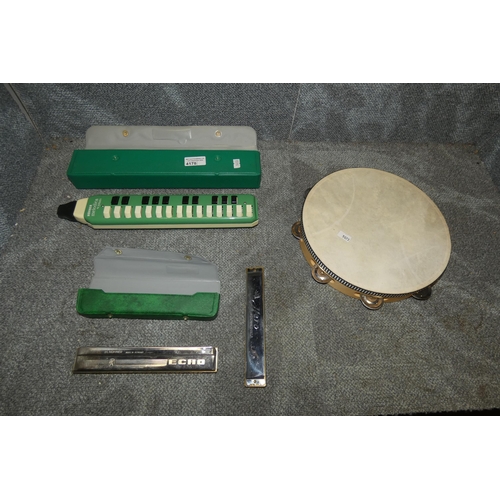 4178 - A Hohner melodica, a Hero harmonica, a Hohner Echo harmonica and a tambourine