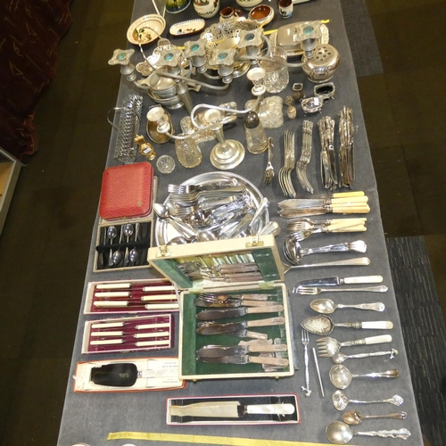 4184 - A large quantity of miscellaneous silver-plated ornaments and cutlery etc