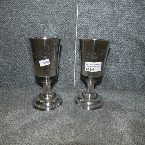4194 - A pair of 20th century silver trophy cups approximately 16cm tall, approximate weight 400gms
