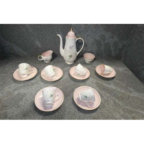 4218 - A floral patterned pink ground coffee set by Susie Cooper