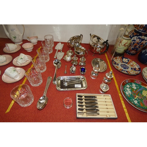 4221 - The three piece silver-plated tea set, a quantity of miscellaneous decorative silver plated ware and... 