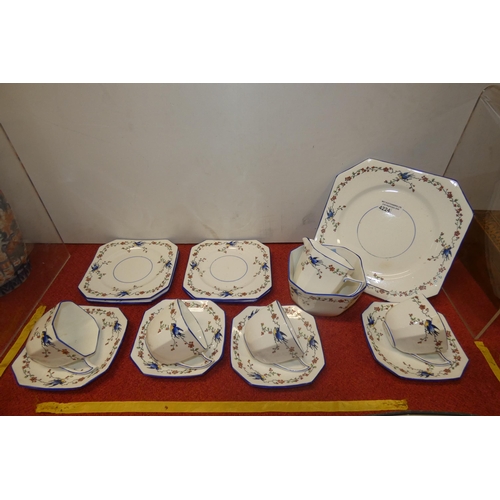 4224 - A blue bird and floral patterned 4 place setting tea set