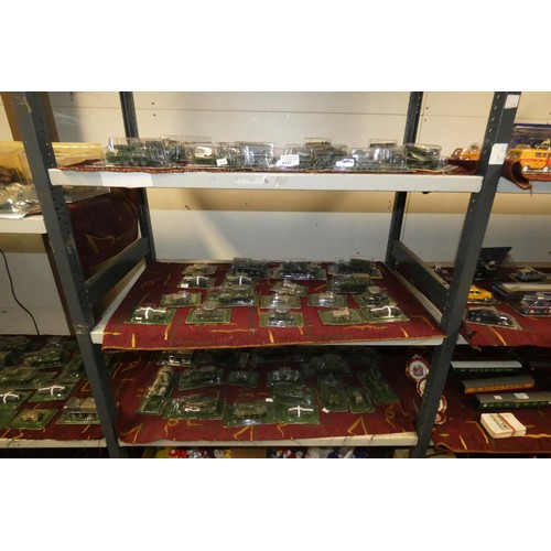 4127 - A collection of boxed miniature model military vehicles (three shelves)